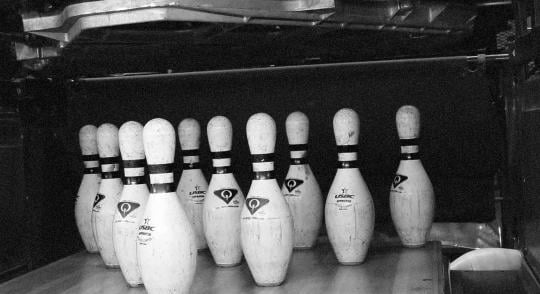 Black and white image of pins